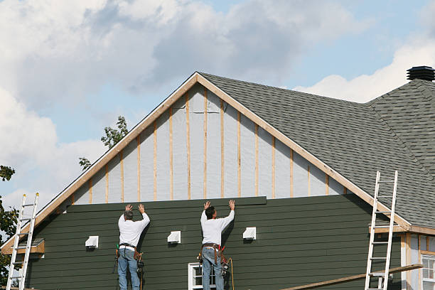 Professional Siding Installation technician working in Madison, NC